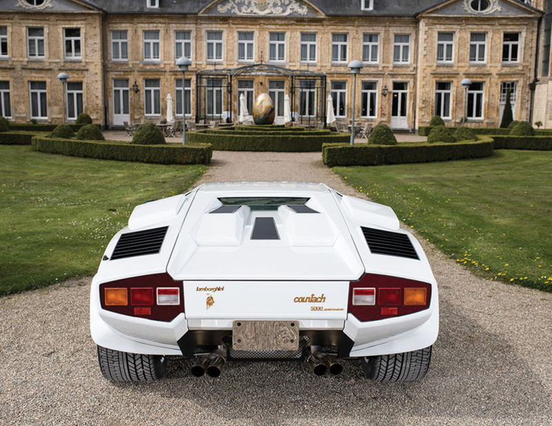 Illustration for article titled I Am Morally Offended By This Gold-Plated Lamborghini Countach Interior